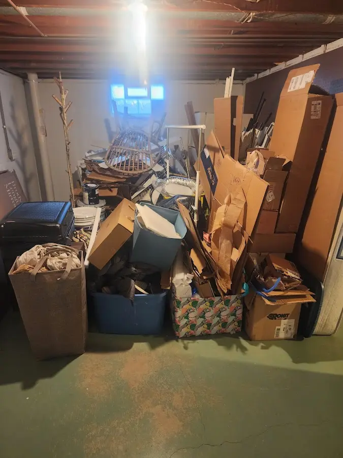 Roll-off dumpster container at job site for 2 Yard Dumpster Rental in Easttown